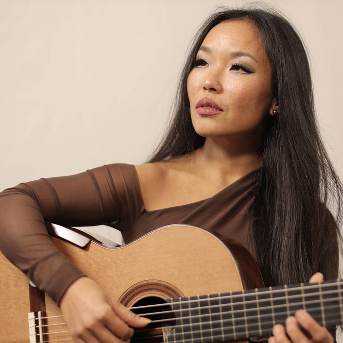 Portrait of classical guitarist Thu Le