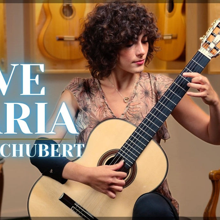 Cristina Galietto playing the classical guitar