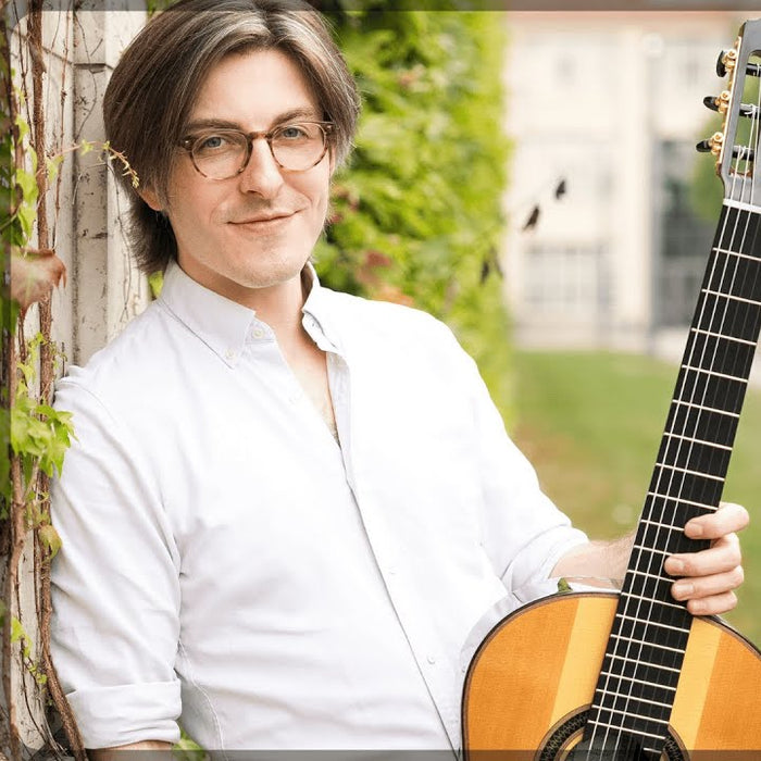 Portrait of guitarist and early-instrument specialist Brandon Acker